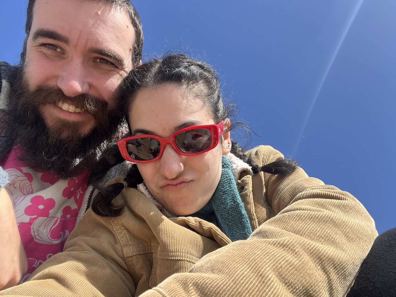 Giulia and Steve taking a sunny close-up photo together